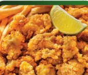 Cracked conch fried golden and served with a wedge of lime
